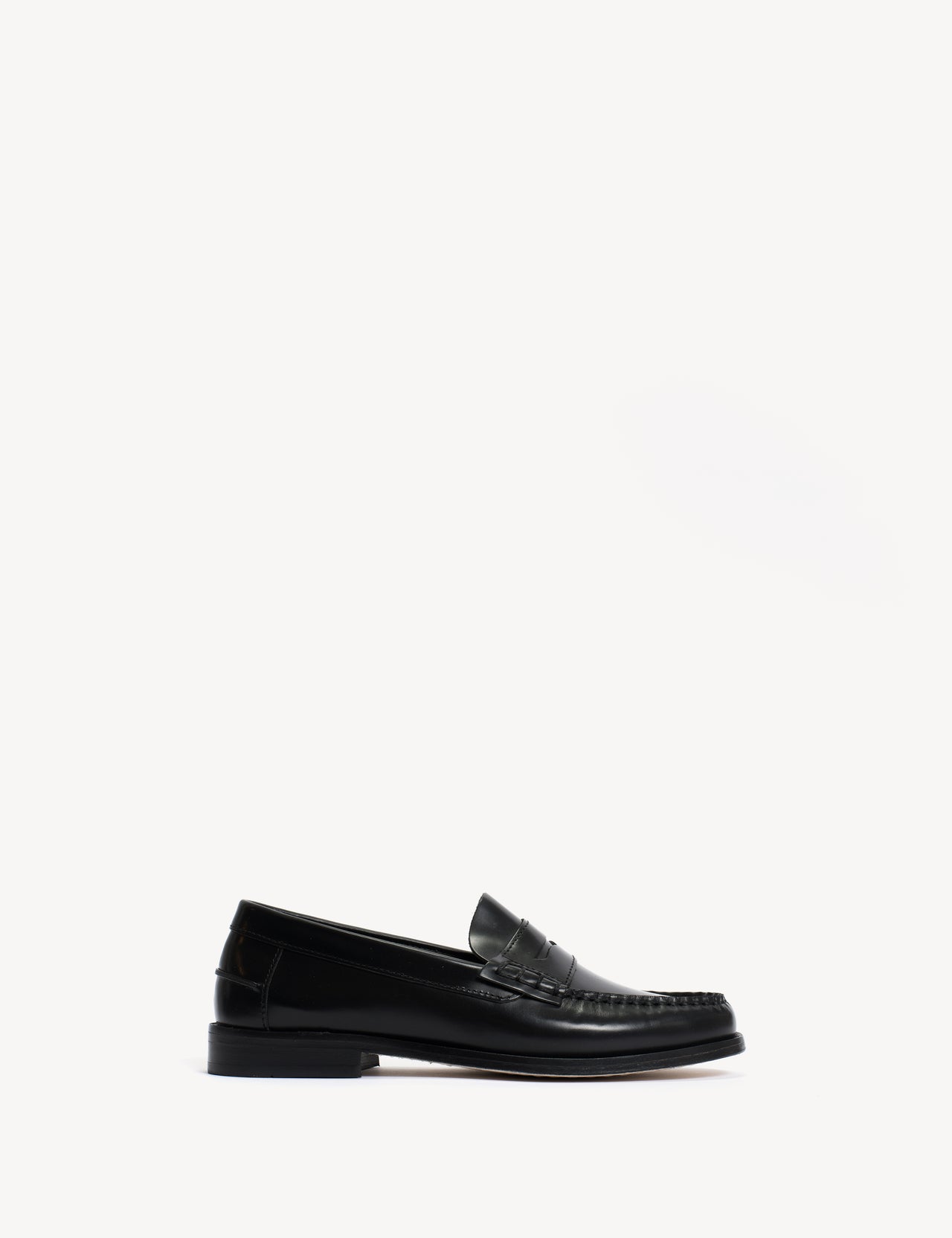 Moccasin Penny Loafer In Black Polido Leather