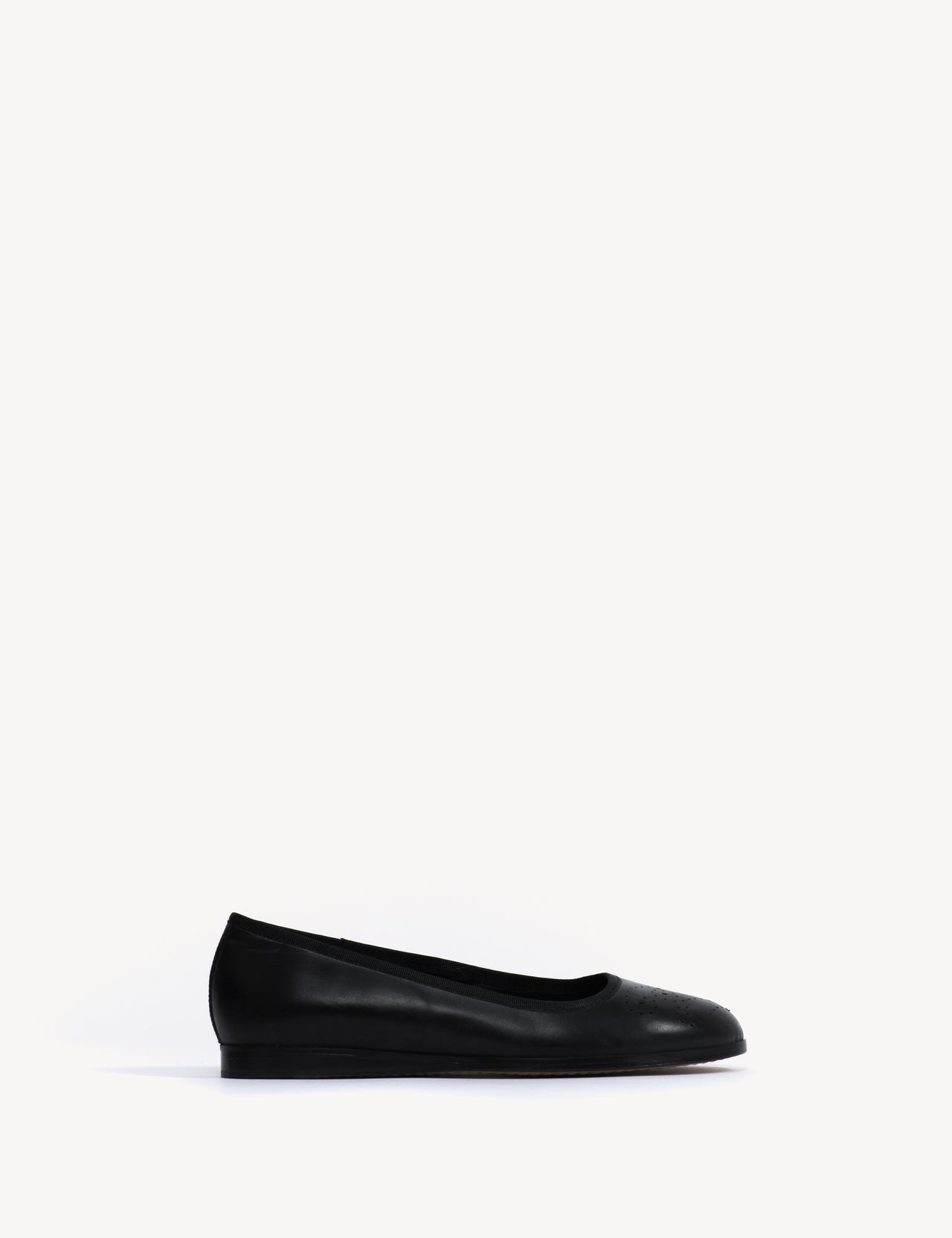 Mari Brogue Flats In Black Escovado Leather