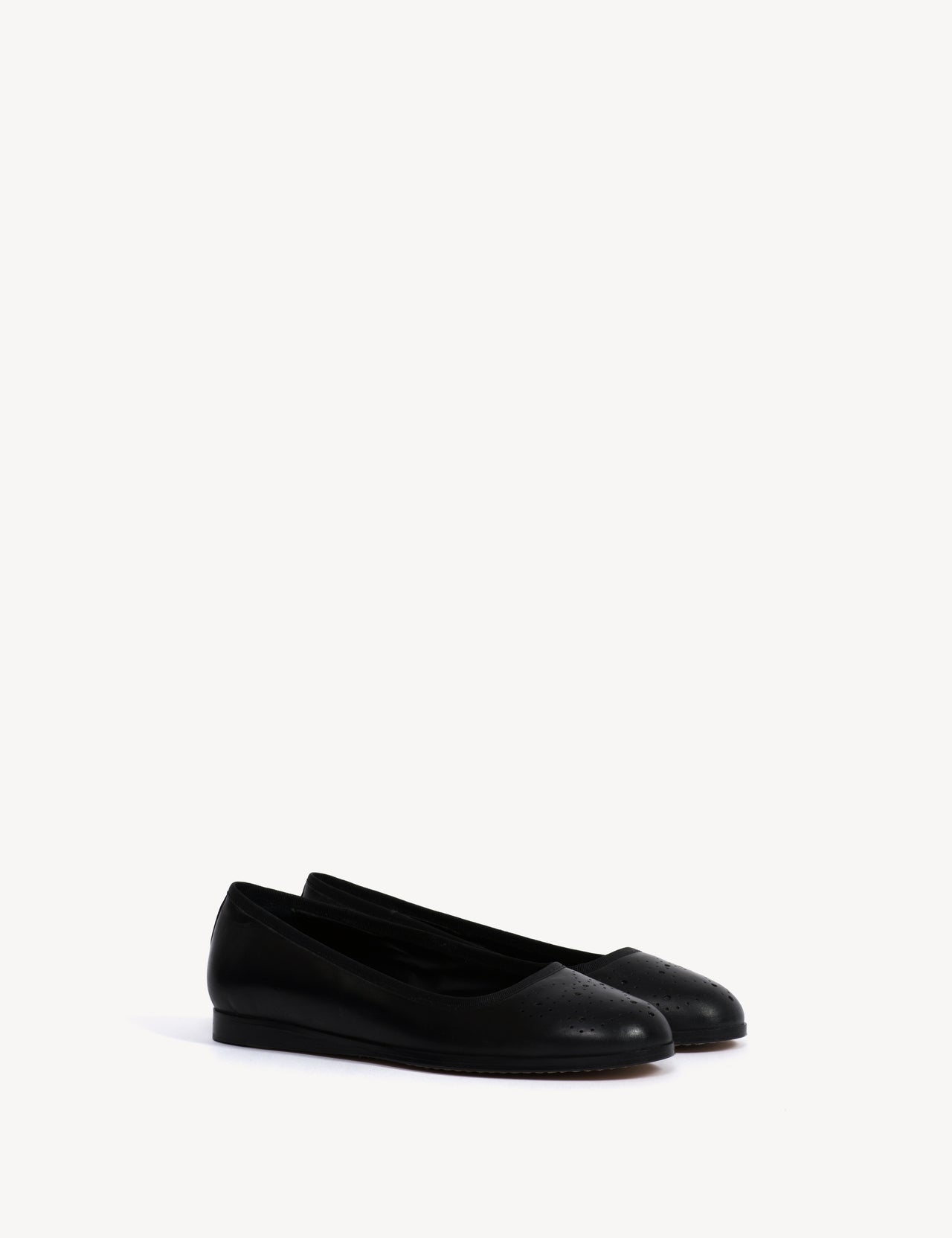 Mari Brogue Flats In Black Escovado Leather