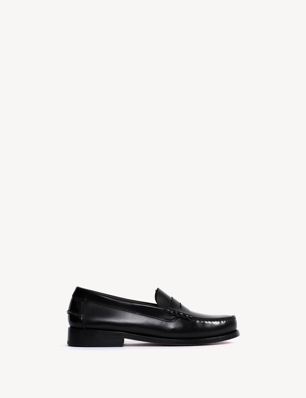 Moccasin Men's Penny Loafer In Black Polido Leather